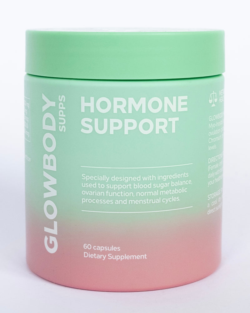 Supplement jar labeled 'Hormone Support' by Glowbody Supps on a light background