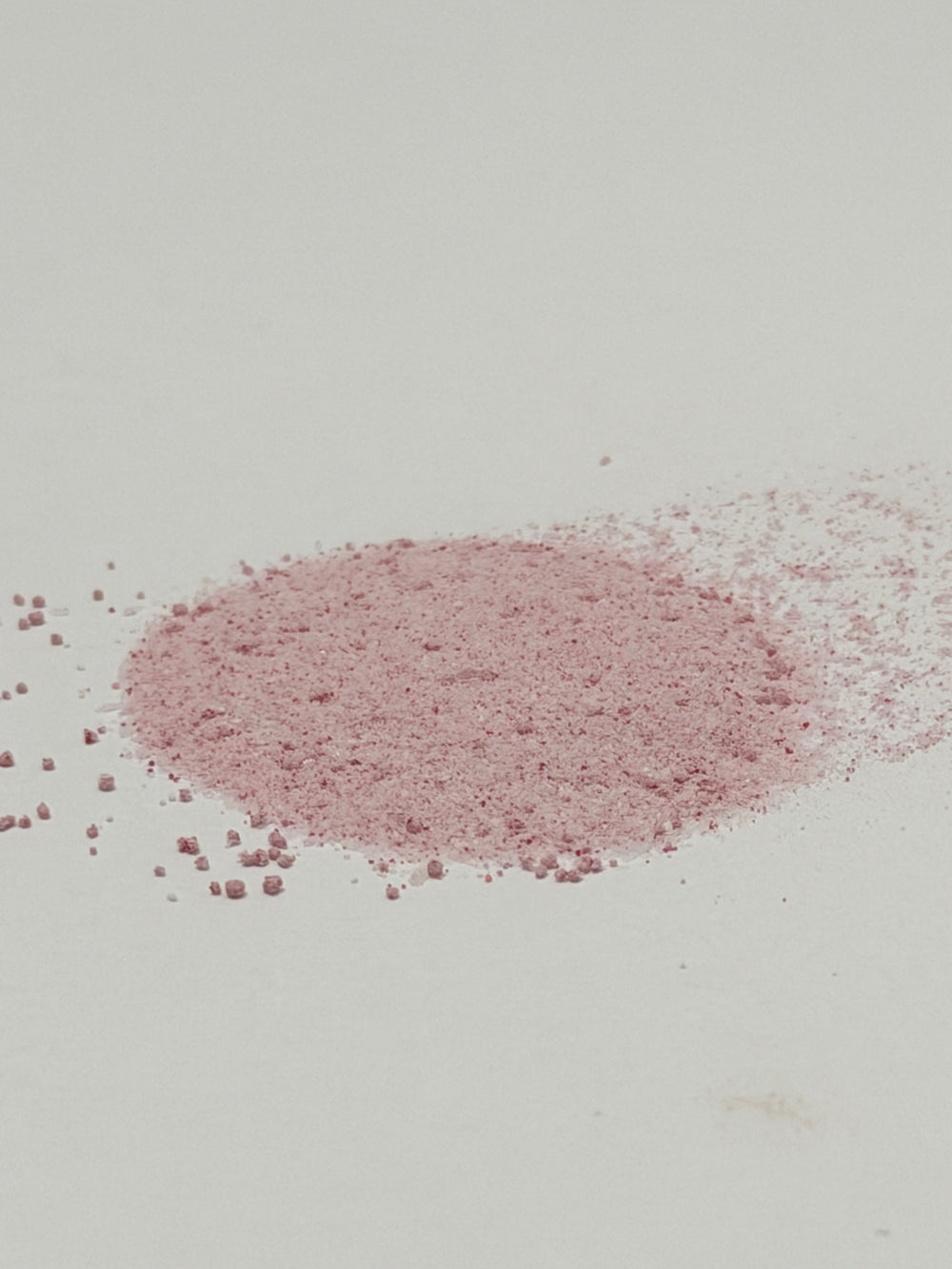 Pink powder on a light gray background. Myo-Inositol and D-Chiro Inositol powder 