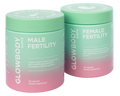 Two multivitamin supplement containers labeled 'Male Fertility' and 'Female Fertility' by Glowbody Supps on a white background.