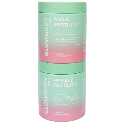 Two multivitamin supplement containers labeled 'Male Fertility' and 'Female Fertility' by Glowbody Supps on a white background.