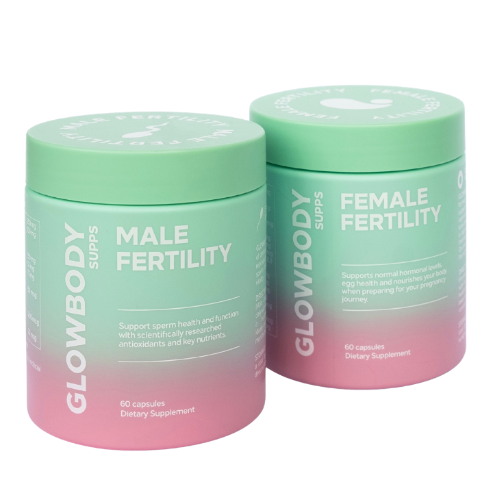 Two Glowbody Supps green and pink supplement jars labeled 'Male Fertility' and 'Female Fertility' on a white background.
